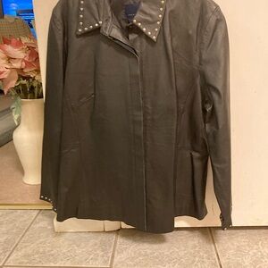 Woman’s leather jacket with matching skirt. 14/16